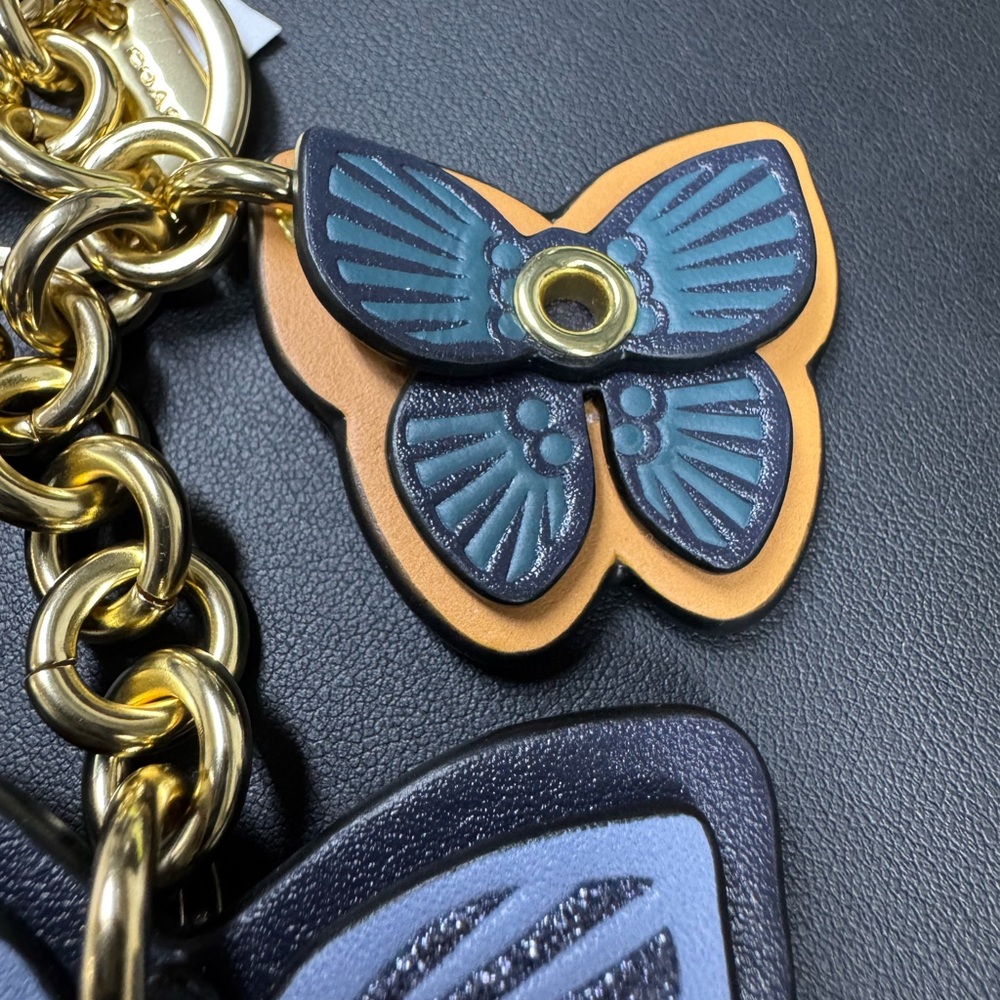 Coach $150 NWT Butterfly Cluster Bag Purse Charm C8224 Gold/Denim Multi - Picture 6 of 8